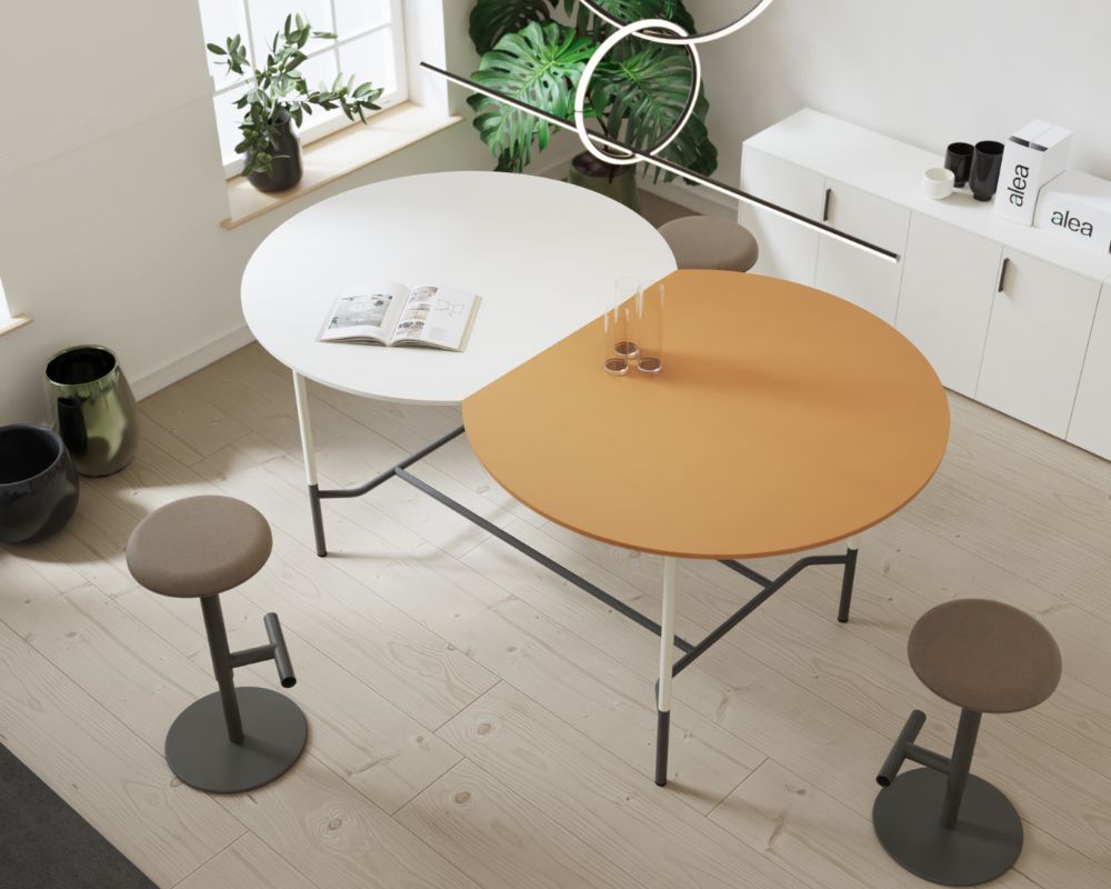 Table fonctionnel ronde et esthétique : collection Rendez-Vous, avec plateaux spacieux et matériaux variés, offrant une solution parfaite pour des environnements de travail partagés.