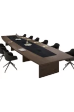 Polyvalente et élégante, la collection Odeon permet de créer des tables de réunion modulaires. La version bois s’agrémente d’un insert en cuir raffiné avec coutures contrastées.