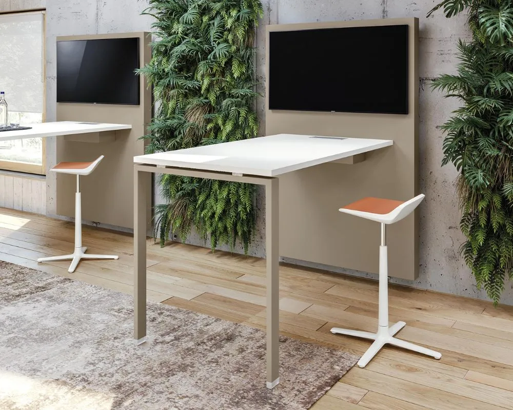 Table de la collection Atreo, combinant design moderne et fonctionnalité pour des espaces de réunion flexibles ou des postes de travail interactifs.