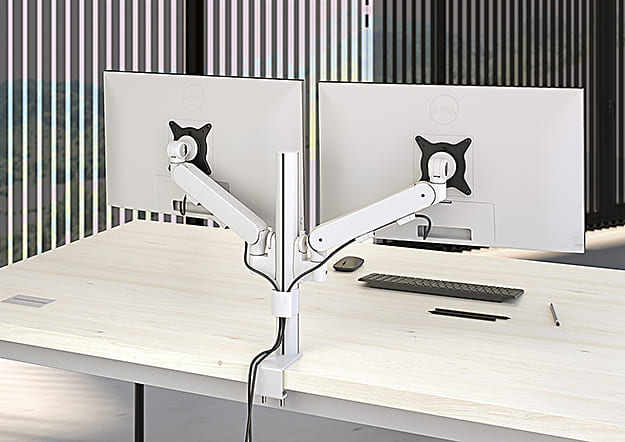 Double support écran Plug and Play installé sur un bureau moderne, permettant une organisation ergonomique et un gain d’espace.